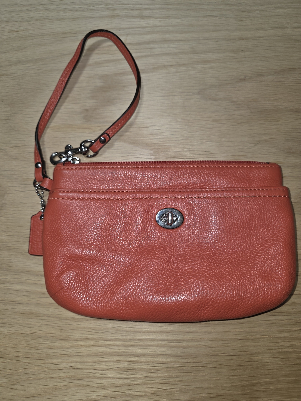 Coach Coral Orange Pebble Leather Wristlet with Turnlock
